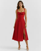Vestido midi con corsé y abertura