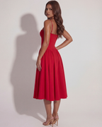 Vestido midi con corsé y falda fluida