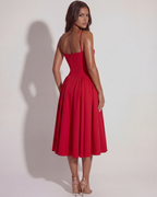 Vestido midi con corsé y falda fluida