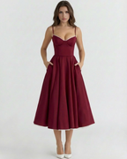 Vestido midi con corsé y falda amplia
