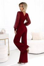 Iris™ | Jumpsuit met V-hals en Glitters op de Mouwen