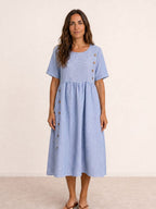 Vestido midi fluido con botones