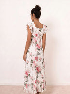 Vestido midi floral plisado con volantes