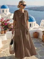 Vestido midi fluido con lazada al cuello