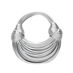 Bolso rígido dorado de diseño escultural